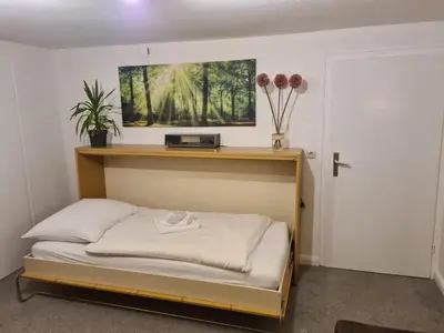 Ein Bett oder Betten in einem Zimmer der Unterkunft Ferienwohnung Rieger 2