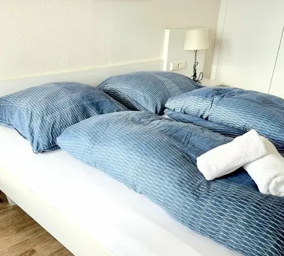 Ein Bett oder Betten in einem Zimmer der Unterkunft Schöne Aussicht - b50247
