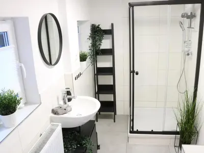 Ein Badezimmer in der Unterkunft Heimat Goslar Apartments 