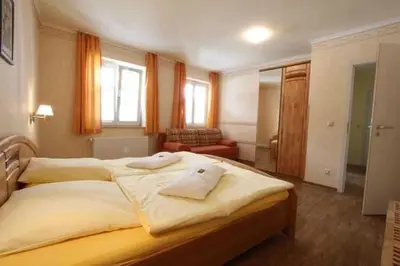 Ein Bett oder Betten in einem Zimmer der Unterkunft Ferienresidenz Schlossblick