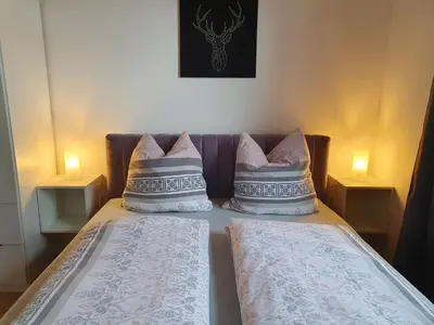 Ein Bett oder Betten in einem Zimmer der Unterkunft Haus Sonnenblick