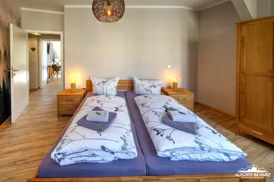Ein Bett oder Betten in einem Zimmer der Unterkunft Auszeit-im-Harz Haus 1 Wohnung Wurmberg