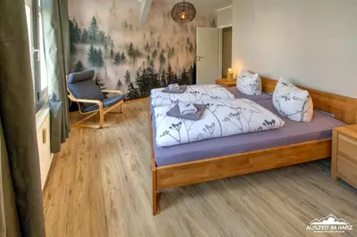 Ein Bett oder Betten in einem Zimmer der Unterkunft Auszeit-im-Harz Haus 1 Wohnung Wurmberg