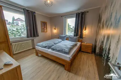 Ein Bett oder Betten in einem Zimmer der Unterkunft Auszeit-im-Harz Haus 3 Wohnung 3