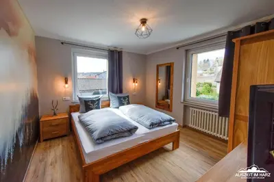 Ein Bett oder Betten in einem Zimmer der Unterkunft Auszeit-im-Harz Haus 3 Wohnung 4