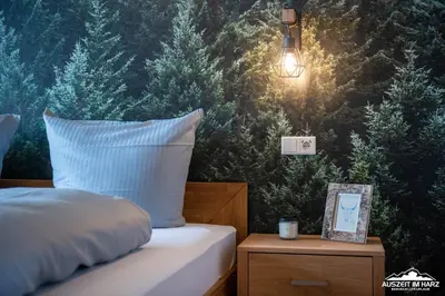 Ein Bett oder Betten in einem Zimmer der Unterkunft Auszeit-im-Harz Haus 3 Wohnung 4
