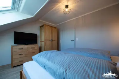 Ein Bett oder Betten in einem Zimmer der Unterkunft Auszeit-im-Harz Haus 3 Wohnung 7