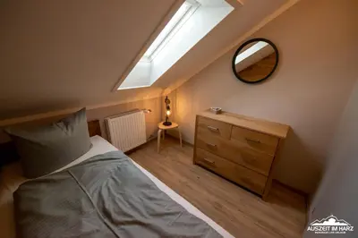 Ein Bett oder Betten in einem Zimmer der Unterkunft Auszeit-im-Harz Haus 3 Wohnung 7