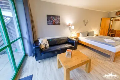 Ein Bett oder Betten in einem Zimmer der Unterkunft Auszeit-im-Harz Haus 5 Wohnung 11