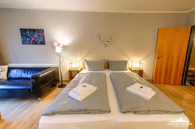 Ein Bett oder Betten in einem Zimmer der Unterkunft Auszeit-im-Harz Haus 5 Wohnung 11