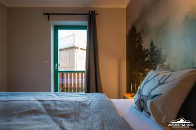Ein Bett oder Betten in einem Zimmer der Unterkunft Auszeit-im-Harz Haus 5 Wohnung 24