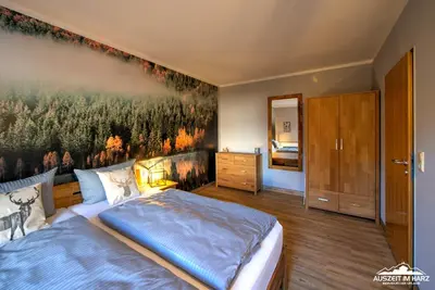 Ein Bett oder Betten in einem Zimmer der Unterkunft Auszeit-im-Harz Haus 5 Wohnung 25