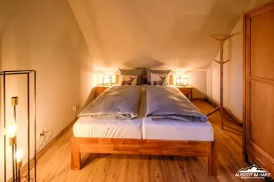 Ein Bett oder Betten in einem Zimmer der Unterkunft Auszeit-im-Harz Haus 5 Wohnung 31