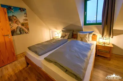 Ein Bett oder Betten in einem Zimmer der Unterkunft Auszeit-im-Harz Haus 5 Wohnung 31