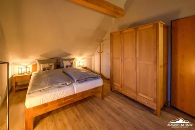 Ein Bett oder Betten in einem Zimmer der Unterkunft Auszeit-im-Harz Haus 5 Wohnung 31