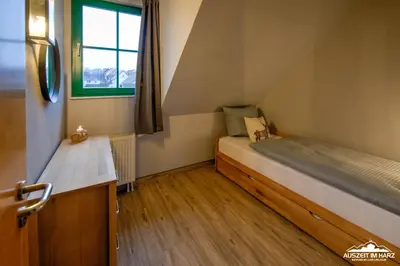 Ein Bett oder Betten in einem Zimmer der Unterkunft Auszeit-im-Harz Haus 5 Wohnung 33