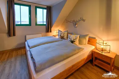 Ein Bett oder Betten in einem Zimmer der Unterkunft Auszeit-im-Harz Haus 5 Wohnung 33