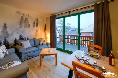 Ein Sitzbereich in der Unterkunft Auszeit-im-Harz Haus 5 Wohnung 33