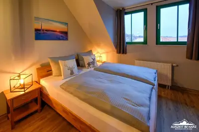 Ein Bett oder Betten in einem Zimmer der Unterkunft Auszeit-im-Harz Haus 5 Wohnung 34