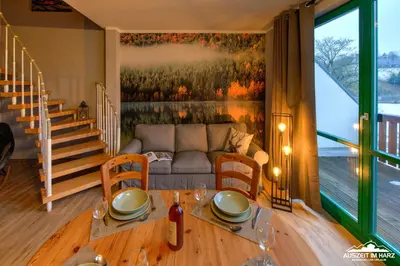 Ein Sitzbereich in der Unterkunft Auszeit-im-Harz Haus 5 Wohnung 35