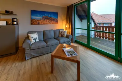 Ein Sitzbereich in der Unterkunft Auszeit-im-Harz Haus 5 Wohnung 36