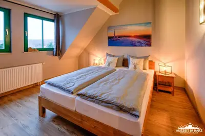 Ein Bett oder Betten in einem Zimmer der Unterkunft Auszeit-im-Harz Haus 5 Wohnung 37