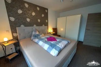 Ein Bett oder Betten in einem Zimmer der Unterkunft Auszeit-im-Harz Haus 6 Wohnung 1