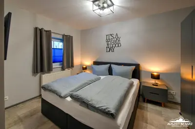 Ein Bett oder Betten in einem Zimmer der Unterkunft Auszeit-im-Harz Haus 6 Ferienhaus