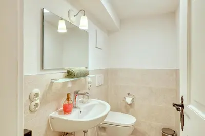 Ein Badezimmer in der Unterkunft Ferienwohnungen Steinweg 61