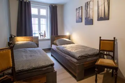 Ein Bett oder Betten in einem Zimmer der Unterkunft Zum Stadtknecht-inkl. Parkplatz