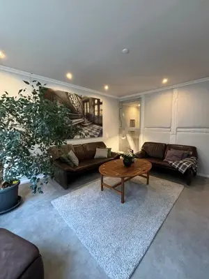 Ein Sitzbereich in der Unterkunft Ambiente am Breiten Tor Apartment 1