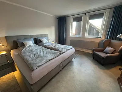 Ein Bett oder Betten in einem Zimmer der Unterkunft Ambiente am Breiten Tor Apartment 2