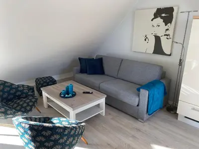 Ein Sitzbereich in der Unterkunft Langensteiner Idyll
