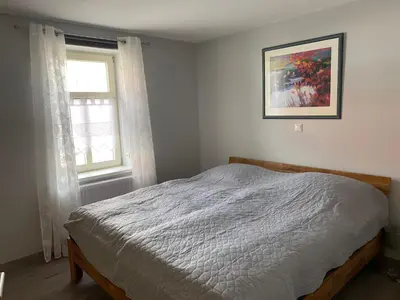 Ein Bett oder Betten in einem Zimmer der Unterkunft Langensteiner Idyll