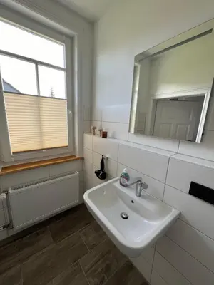 Ein Badezimmer in der Unterkunft Kleines Berghaus #2