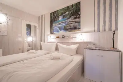 Ein Bett oder Betten in einem Zimmer der Unterkunft Kaminflair