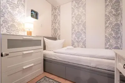 Ein Bett oder Betten in einem Zimmer der Unterkunft Kaminflair