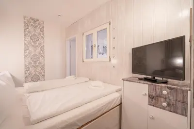 Ein Bett oder Betten in einem Zimmer der Unterkunft Kaminflair