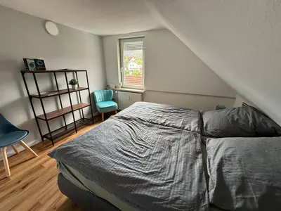 Ein Bett oder Betten in einem Zimmer der Unterkunft NEU! Canossablick Bad Harzburg Inklusive Bettwäsche