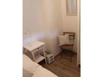Ein Bett oder Betten in einem Zimmer der Unterkunft Holiday apartment small building