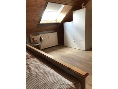 Ein Bett oder Betten in einem Zimmer der Unterkunft Holiday apartment small building