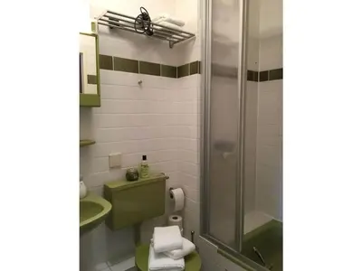 Ein Badezimmer in der Unterkunft Holiday apartment small building