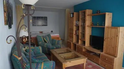 Ein Sitzbereich in der Unterkunft Ferienwohnung Schöne Aussicht