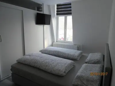 Ein Bett oder Betten in einem Zimmer der Unterkunft FeWo Witt Annenburg