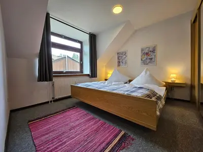 Ein Bett oder Betten in einem Zimmer der Unterkunft Ferienwohnung HBO Abbassian