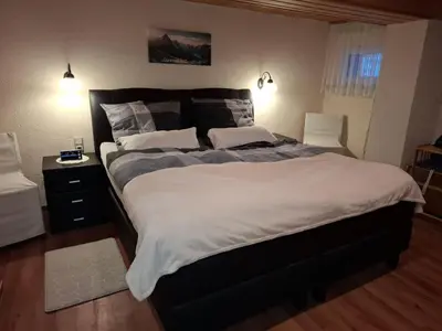Ein Bett oder Betten in einem Zimmer der Unterkunft Ferienwohnung Haus am Wald