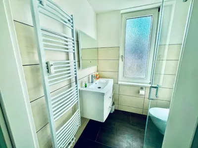 Ein Badezimmer in der Unterkunft FeWo Münch Braunlage I Verwaltung und Betreuung durch FIRMA ZZ-Braunlage