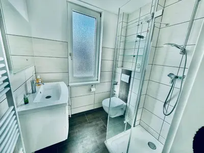 Ein Badezimmer in der Unterkunft FeWo Münch Braunlage I Verwaltung und Betreuung durch FIRMA ZZ-Braunlage