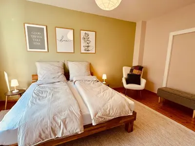 Ein Bett oder Betten in einem Zimmer der Unterkunft Ferienwohnung Kaiserliebe