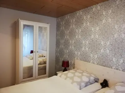 Ein Bett oder Betten in einem Zimmer der Unterkunft Ferienwohnung Turmeck